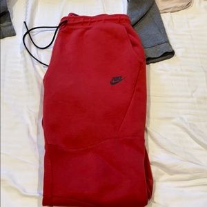 Red Nike tech pack jogger sweatpants